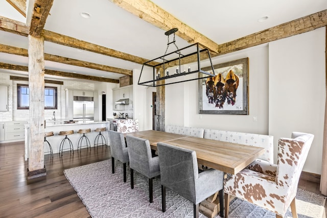 99 Little Belt Way, Belt, MT 59412 - dining area with beamed ceiling, dark wood-style flooring, a chandelier, and recessed lighting