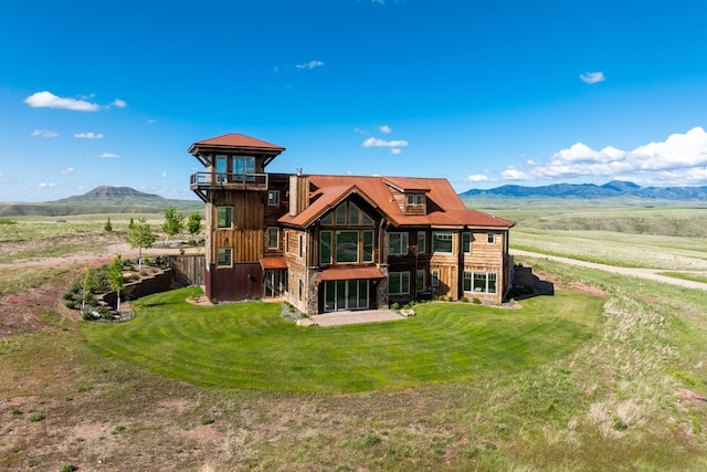 99 Little Belt Way, Belt, MT 59412 - rear view of property featuring a mountain view and a lawn