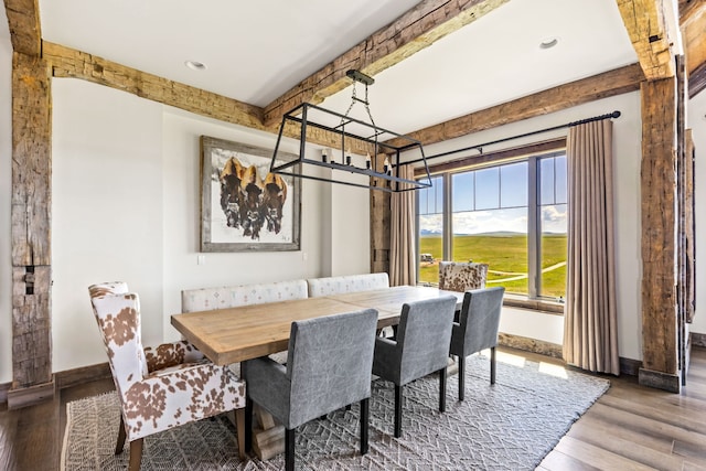 99 Little Belt Way, Belt, MT 59412 - dining space featuring beamed ceiling, baseboards, wood finished floors, recessed lighting, and a chandelier