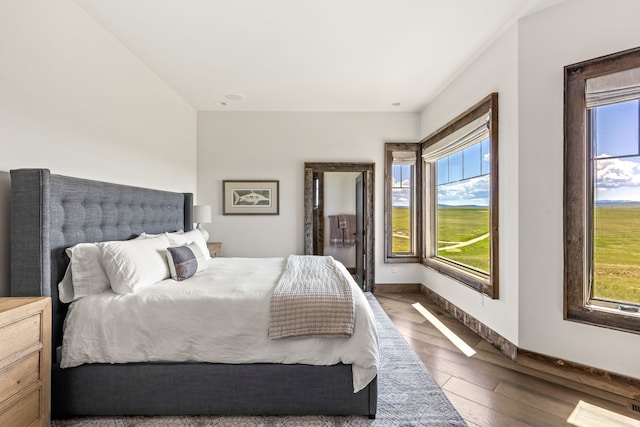 99 Little Belt Way, Belt, MT 59412 - bedroom featuring wood finished floors and baseboards