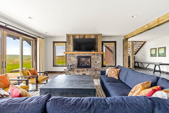99 Little Belt Way, Belt, MT 59412 - living room featuring wood finished floors, a fireplace, recessed lighting, and baseboards
