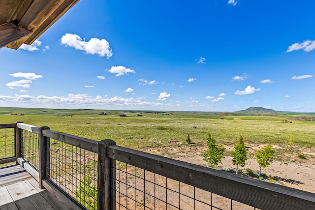 99 Little Belt Way, Belt, MT 59412 - wooden terrace with a rural view