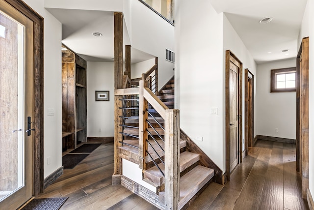 99 Little Belt Way, Belt, MT 59412 - stairway featuring wood-type flooring, baseboards, and recessed lighting