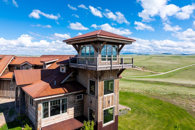 99 Little Belt Way, Belt, MT 59412 - rear view of property featuring a lawn and a balcony