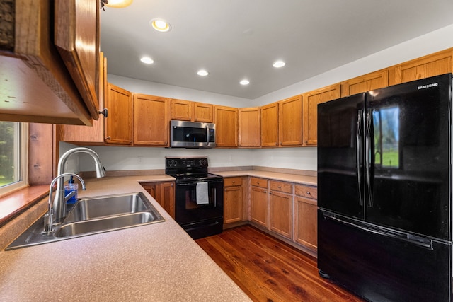 370 Prospector Trl, Bozeman, MT 59718 - kitchen with black appliances, a sink, dark wood finished floors, recessed lighting, and light countertops