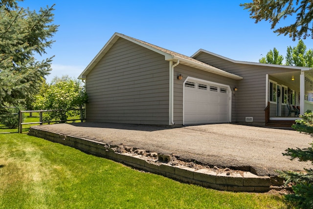 370 Prospector Trl, Bozeman, MT 59718 - view of side of home featuring a garage and driveway