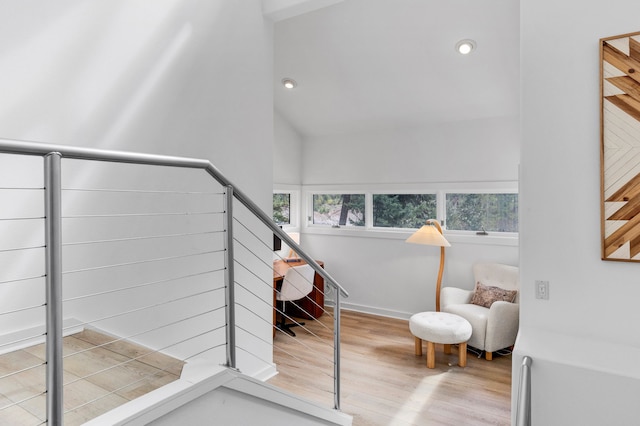 33535 Cherry Ln, Bigfork, MT 59911 - stairway with wood finished floors, recessed lighting, and vaulted ceiling