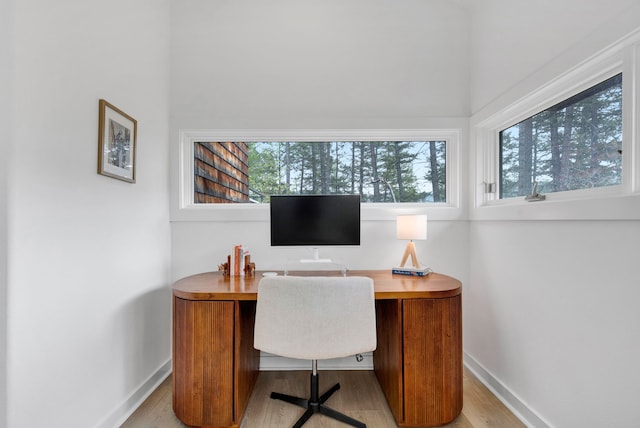 33535 Cherry Ln, Bigfork, MT 59911 - office area with light wood-type flooring and baseboards