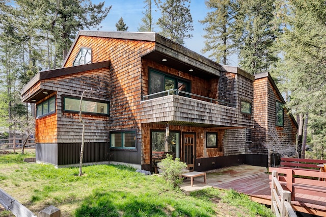 33535 Cherry Ln, Bigfork, MT 59911 - back of house with a balcony