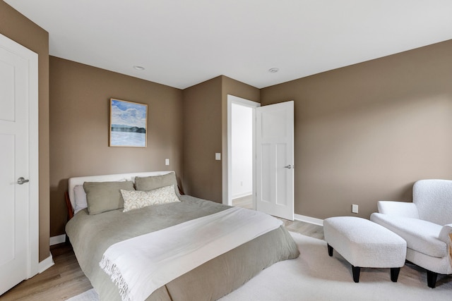 33535 Cherry Ln, Bigfork, MT 59911 - bedroom with light wood finished floors and recessed lighting