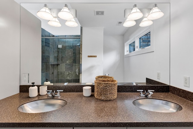 33535 Cherry Ln, Bigfork, MT 59911 - full bathroom featuring a stall shower and double vanity