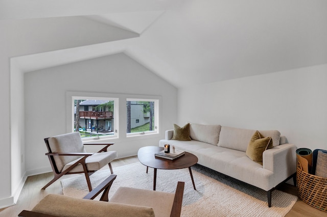 33535 Cherry Ln, Bigfork, MT 59911 - living area featuring light wood finished floors and vaulted ceiling