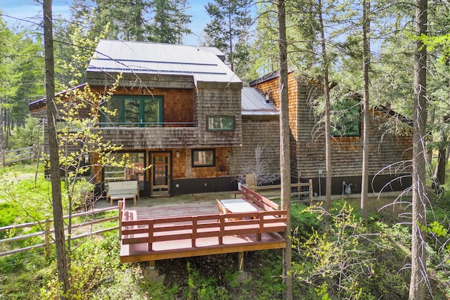33535 Cherry Ln, Bigfork, MT 59911 - back of house with a deck