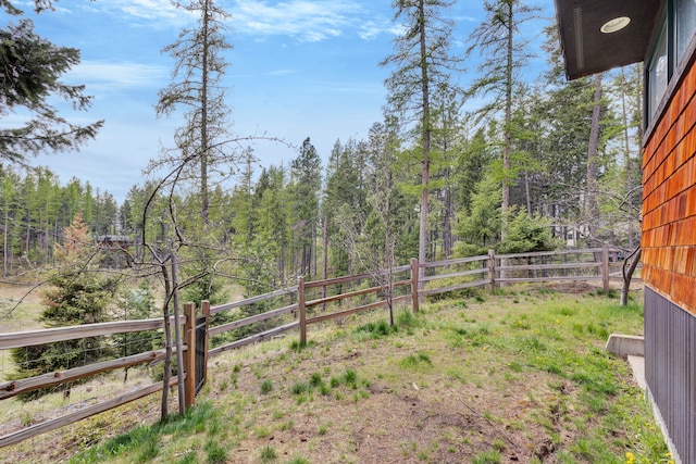33535 Cherry Ln, Bigfork, MT 59911 - view of yard featuring a wooded view