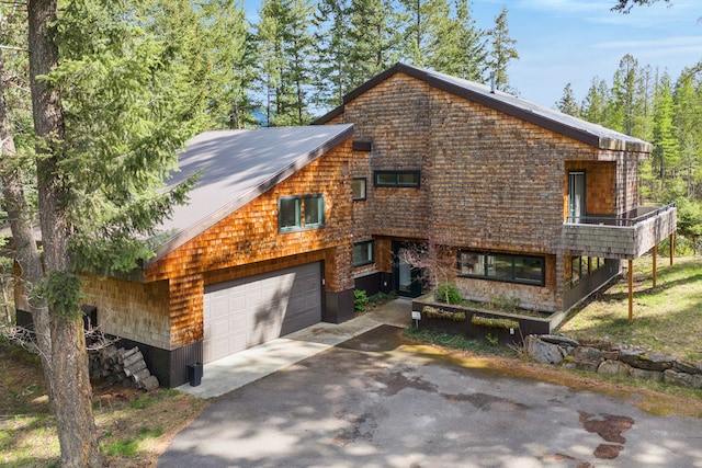 33535 Cherry Ln, Bigfork, MT 59911 - view of front of home featuring asphalt driveway