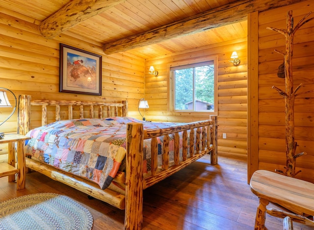 288 Trout Dr, Rexford, MT 59930 - bedroom featuring a wooden ceiling with exposed beams, wood-type flooring, and log walls