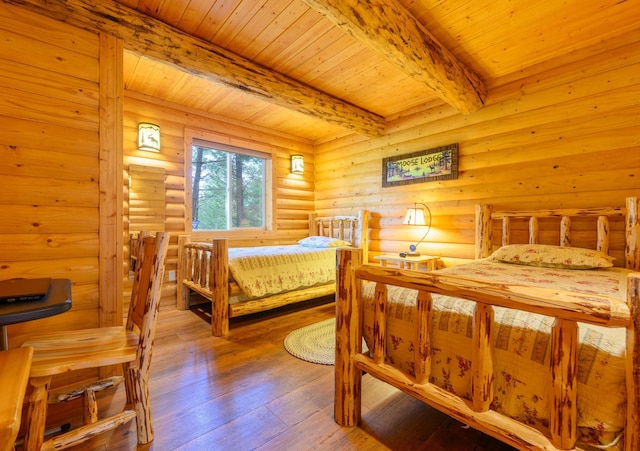 288 Trout Dr, Rexford, MT 59930 - bedroom featuring a wood ceiling with exposed beams, wood-type flooring, and rustic walls