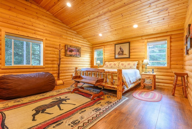 288 Trout Dr, Rexford, MT 59930 - bedroom featuring rustic walls, hardwood / wood-style floors, lofted ceiling, wooden ceiling, and multiple windows