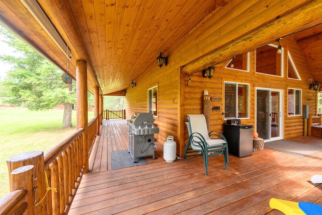288 Trout Dr, Rexford, MT 59930 - wooden terrace featuring area for grilling and a lawn