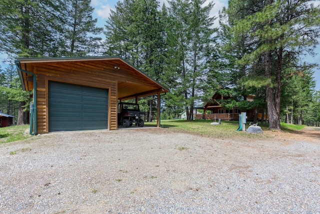 288 Trout Dr, Rexford, MT 59930 - garage featuring gravel driveway