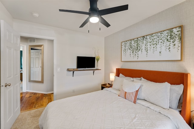 3197 Rose St, Bozeman, MT 59718 - bedroom featuring a ceiling fan, wood finished floors, baseboards, and carpet flooring