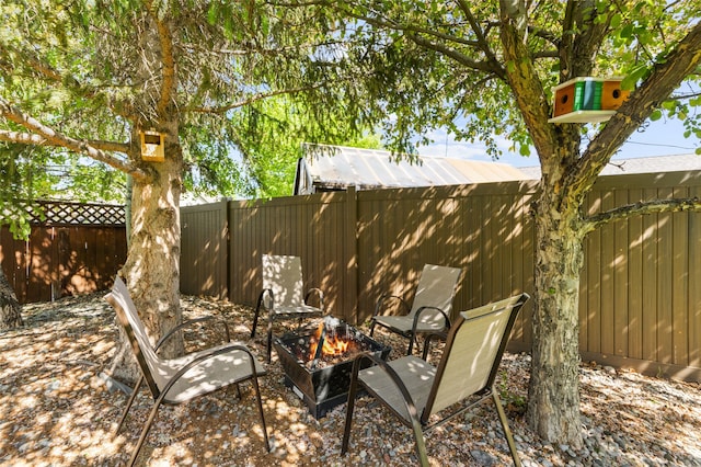 3197 Rose St, Bozeman, MT 59718 - view of yard with an outdoor fire pit