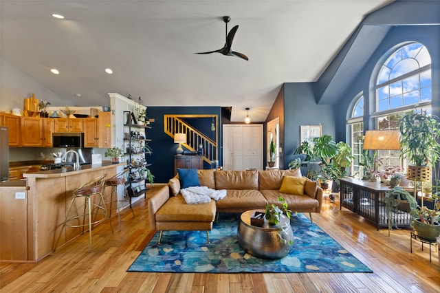3197 Rose St, Bozeman, MT 59718 - living room with stairs, high vaulted ceiling, light wood-style flooring, a ceiling fan, and recessed lighting