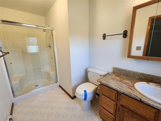 127 Patricia Way, Hamilton, MT 59840 - full bathroom with tile patterned floors, a shower stall, and vanity