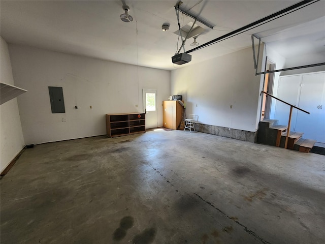 127 Patricia Way, Hamilton, MT 59840 - garage with electric panel and a garage door opener