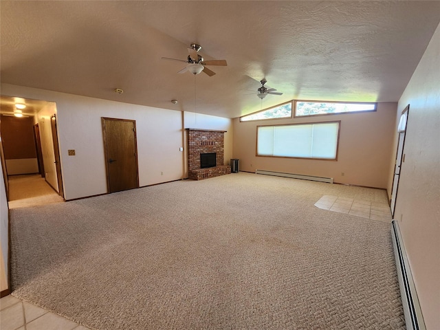 127 Patricia Way, Hamilton, MT 59840 - unfurnished living room with a baseboard radiator, a baseboard heating unit, lofted ceiling, a ceiling fan, and a brick fireplace