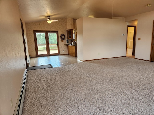 127 Patricia Way, Hamilton, MT 59840 - unfurnished living room with lofted ceiling, baseboard heating, a ceiling fan, light carpet, and light tile patterned floors