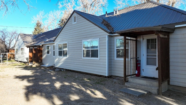 522 Main Ave N, Choteau, MT 59422 - rear view of property featuring a metal roof