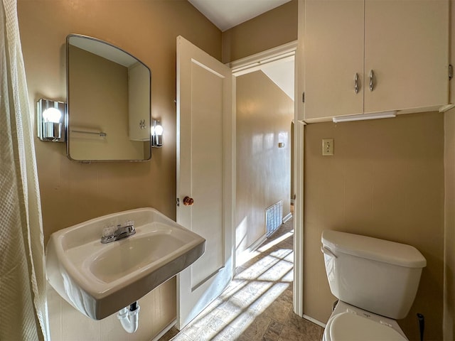 522 Main Ave N, Choteau, MT 59422 - bathroom featuring a sink and stone finish floors