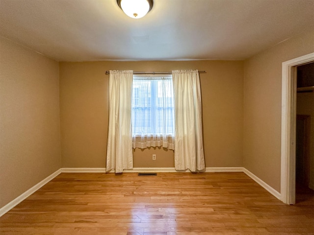 522 Main Ave N, Choteau, MT 59422 - unfurnished room with light wood-style flooring and baseboards
