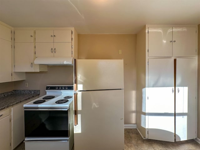522 Main Ave N, Choteau, MT 59422 - kitchen featuring white appliances, under cabinet range hood, dark countertops, and white cabinets