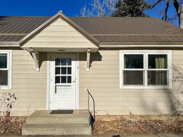 522 Main Ave N, Choteau, MT 59422 - property entrance featuring a metal roof