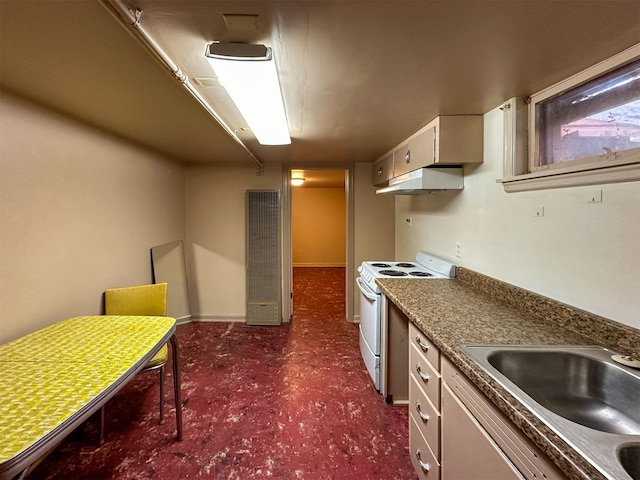 522 Main Ave N, Choteau, MT 59422 - kitchen featuring electric stove, a heating unit, under cabinet range hood, and white cabinets