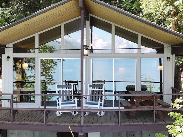 361 Grist Rd, West Glacier, MT 59936 - wooden deck featuring a sunroom