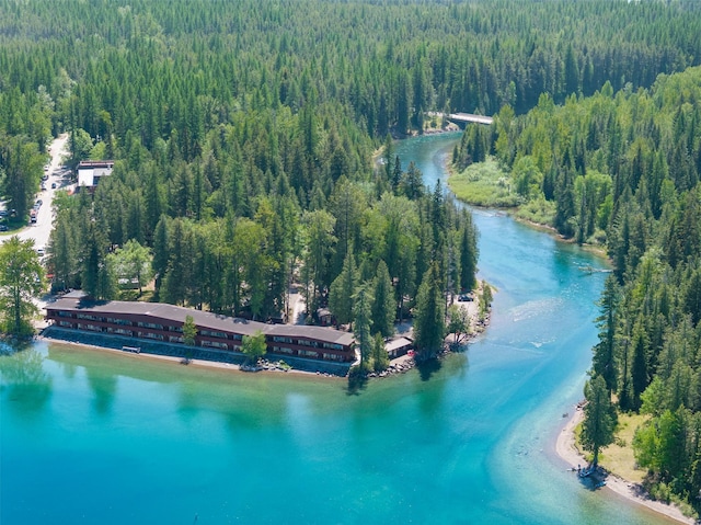 361 Grist Rd, West Glacier, MT 59936 - aerial view of property's location featuring a heavily wooded area and a nearby body of water