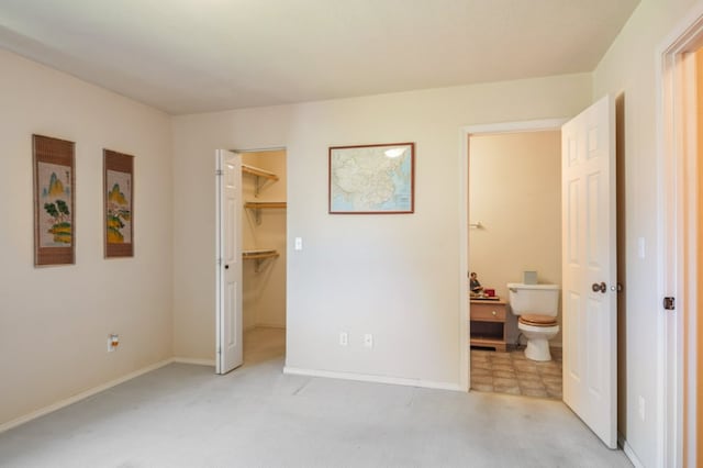 142 Thomas St, Hamilton, MT 59840 - bedroom with light colored carpet, a walk in closet, ensuite bath, and a closet