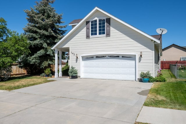 142 Thomas St, Hamilton, MT 59840 - view of front of house with a garage and driveway
