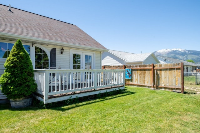 142 Thomas St, Hamilton, MT 59840 - view of yard with a deck with mountain view