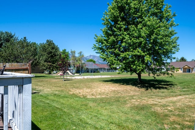 142 Thomas St, Hamilton, MT 59840 - view of grassy yard featuring a playground