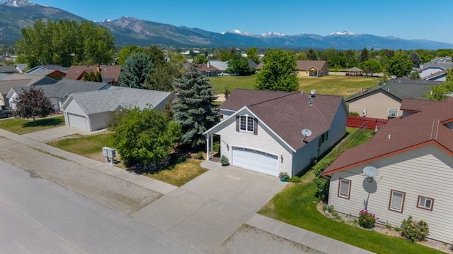 142 Thomas St, Hamilton, MT 59840 - aerial perspective of suburban area featuring a mountain backdrop