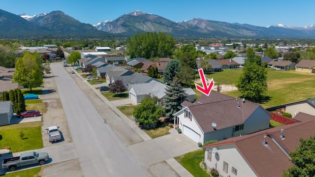 142 Thomas St, Hamilton, MT 59840 - aerial perspective of suburban area featuring a mountainous background
