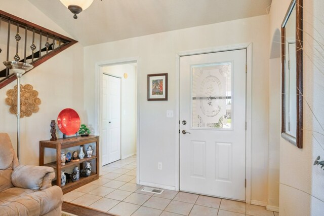 142 Thomas St, Hamilton, MT 59840 - foyer entrance featuring light tile patterned floors and baseboards
