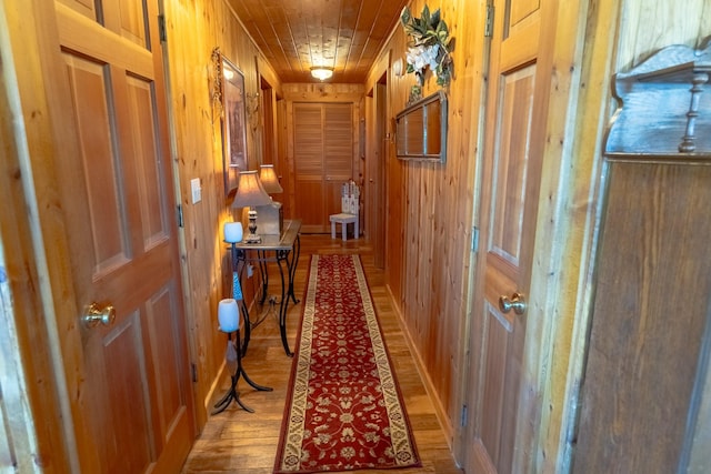 347 Upper Ross Gulch Rd, Townsend, MT 59644 - hall featuring wooden walls, wood finished floors, and wooden ceiling