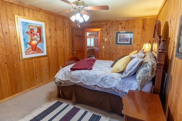 347 Upper Ross Gulch Rd, Townsend, MT 59644 - carpeted bedroom with wooden walls and a ceiling fan