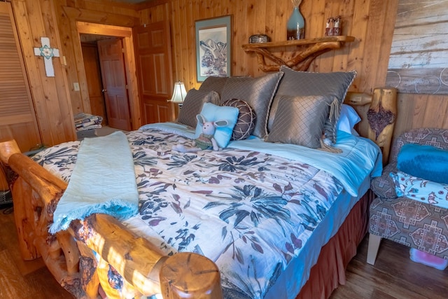 347 Upper Ross Gulch Rd, Townsend, MT 59644 - bedroom featuring wooden walls and wood finished floors