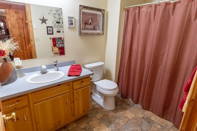 347 Upper Ross Gulch Rd, Townsend, MT 59644 - bathroom featuring stone finish flooring, vanity, and a shower with curtain
